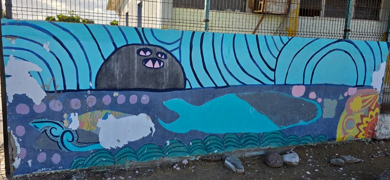 mural in Puerto San Carlos by artist unknown.