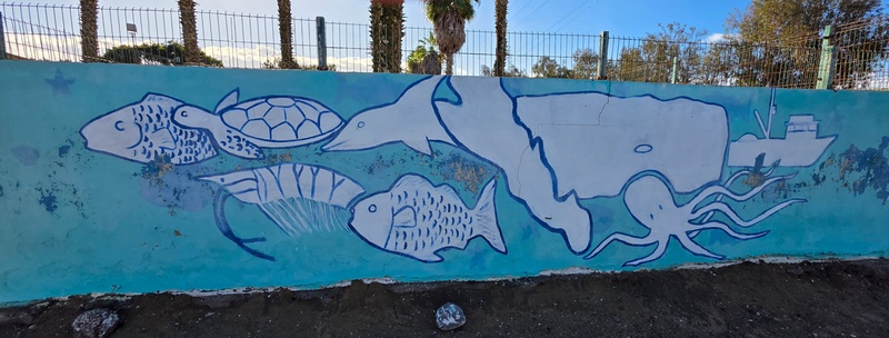 mural in Puerto San Carlos by artist unknown.