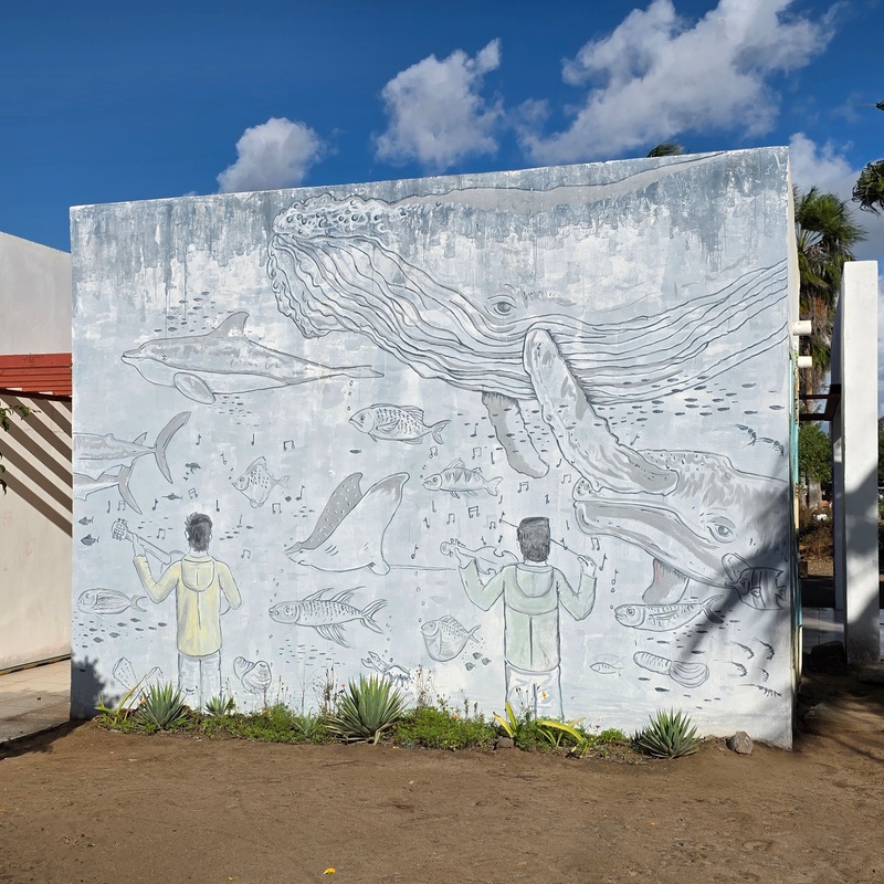 mural in Puerto San Carlos by artist unknown.