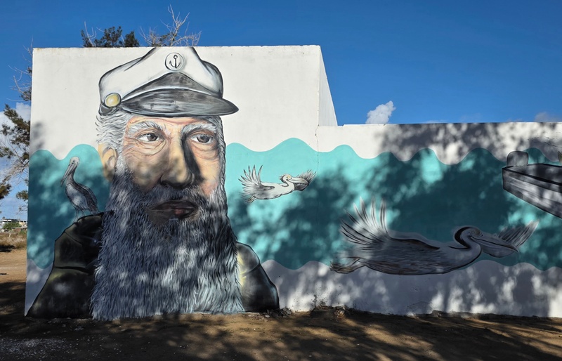 mural in Puerto San Carlos by artist unknown.