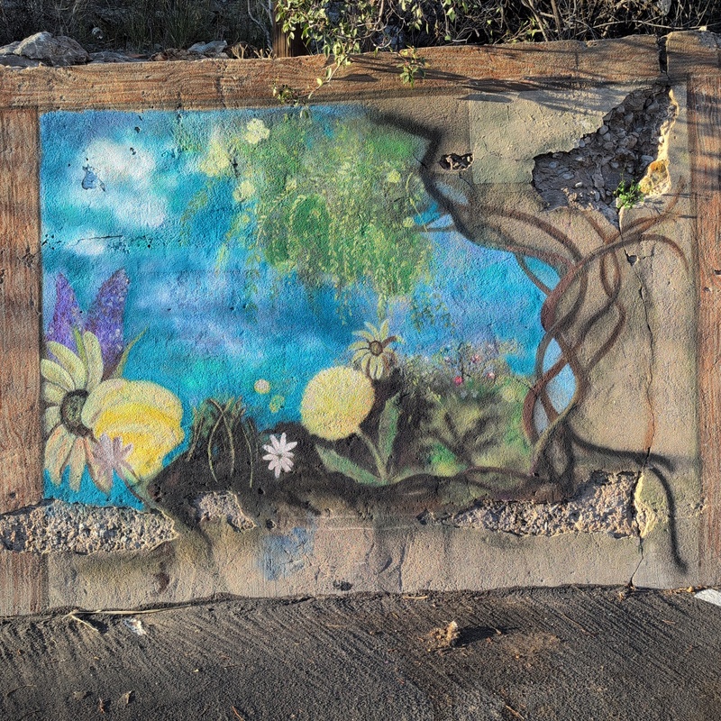 mural in Bisbee by artist unknown.