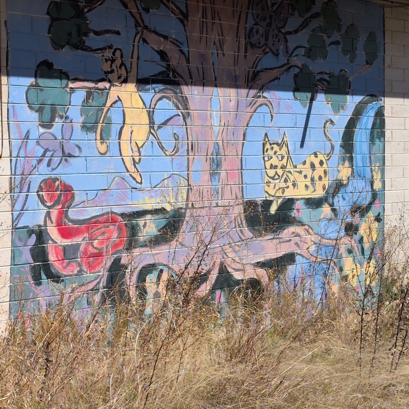 mural in Bisbee by artist unknown.