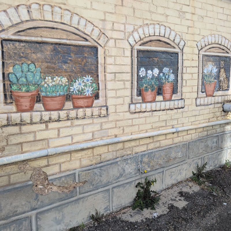 mural in Bisbee by artist unknown.