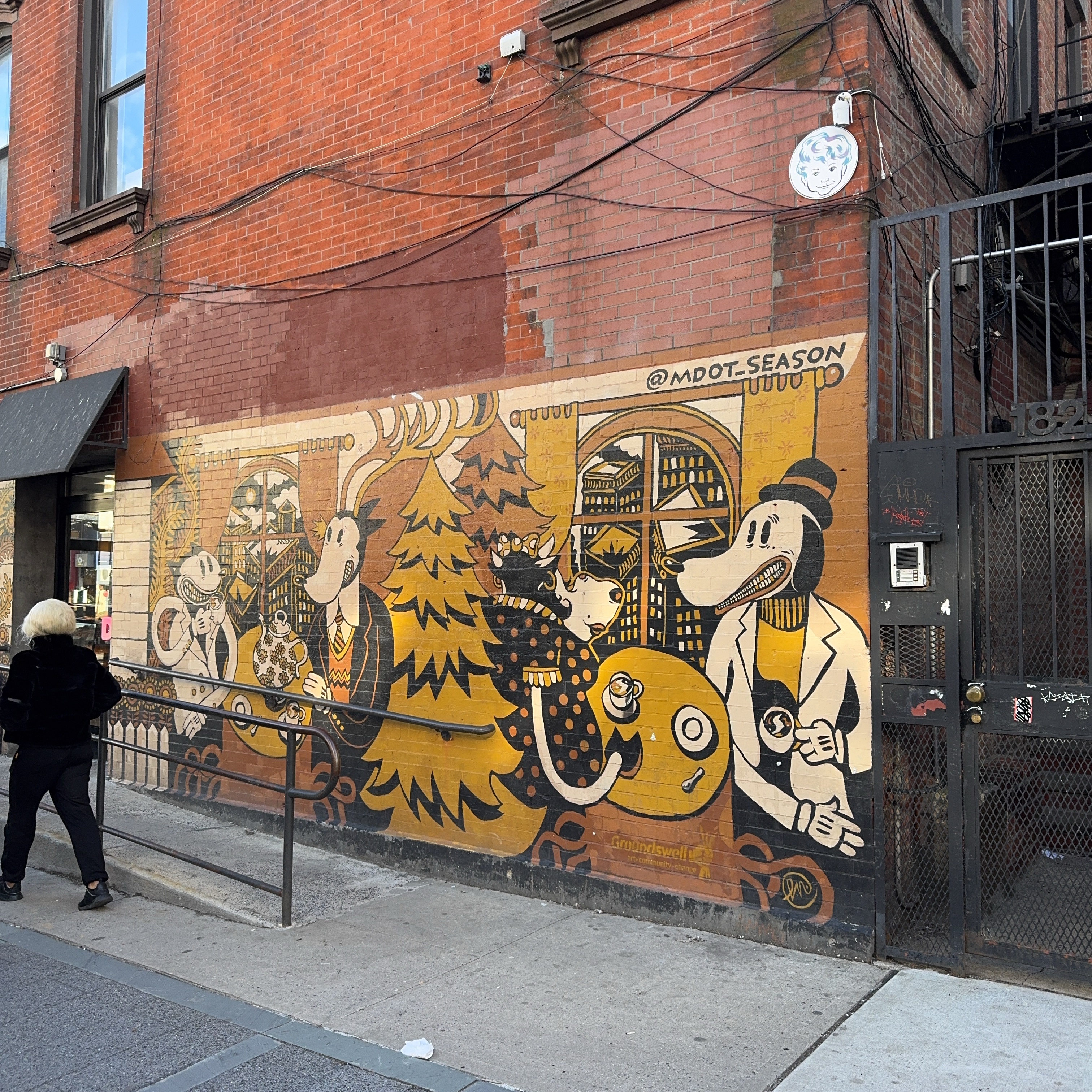 mural in Brooklyn by artist Misha Tyutyunik.