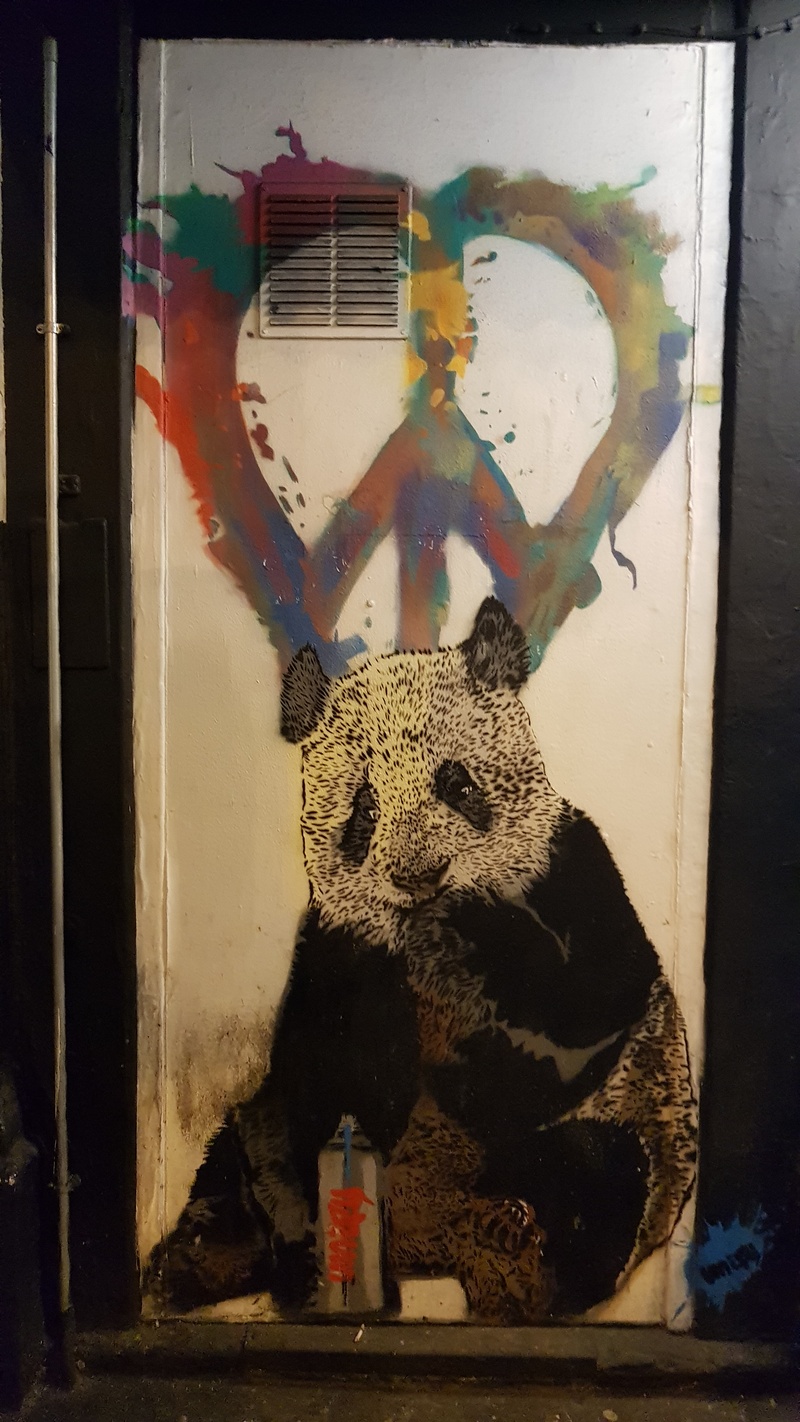 mural in  by artist Unify.