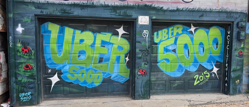 mural in Toronto by artist uber5000.