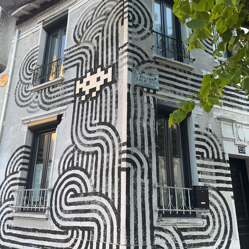 mural in Montreuil by artist Invader.