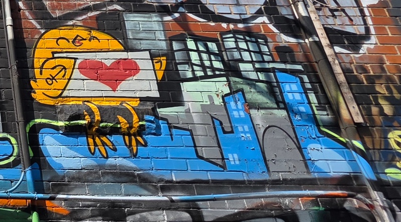 mural in Toronto by artist uber5000.