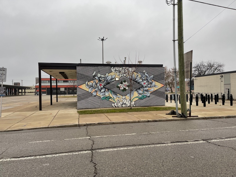 mural in Detroit by artist Ouizi.
