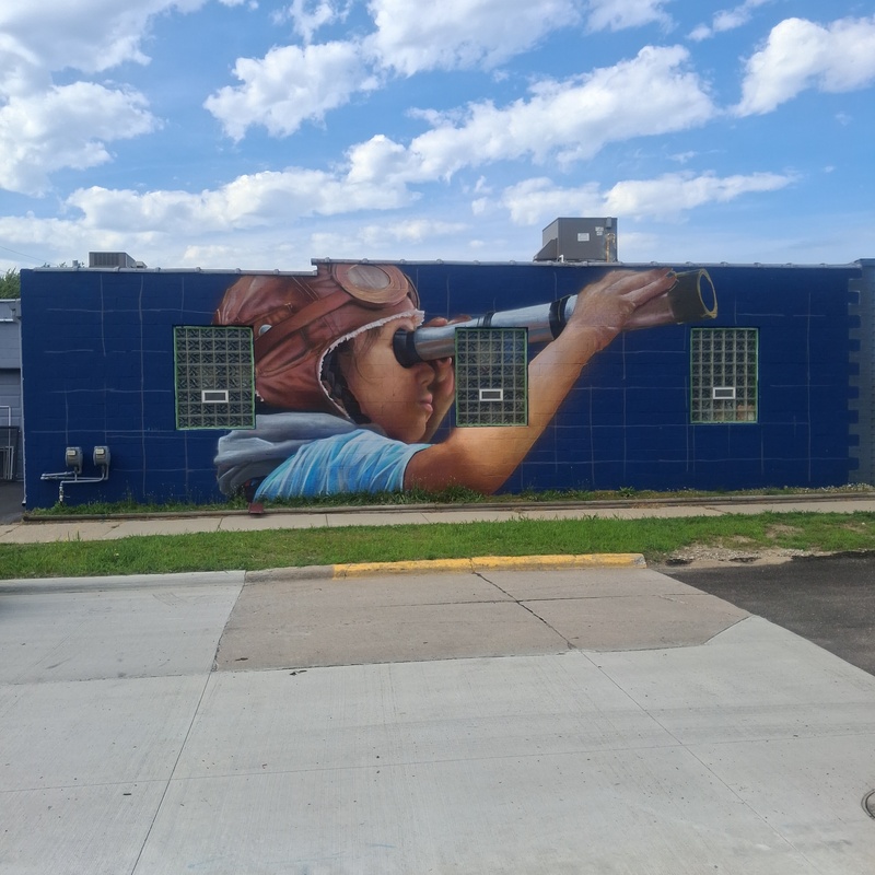 mural in Clawson by artist Zach Curtis.