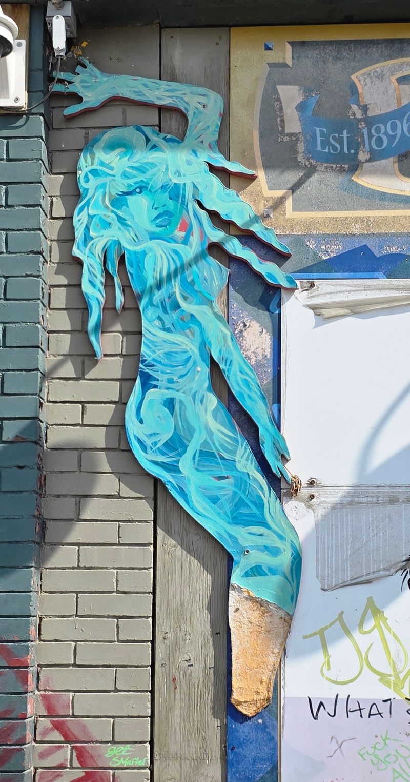 mural in Winnipeg by artist unknown.