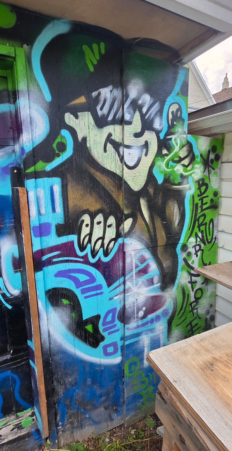 mural in Winnipeg by artist unknown.