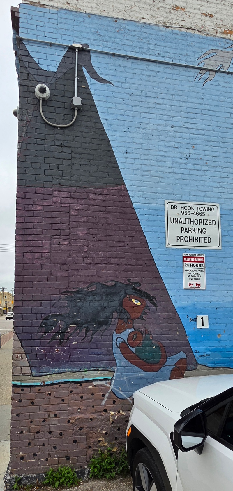 mural in Winnipeg by artist unknown.