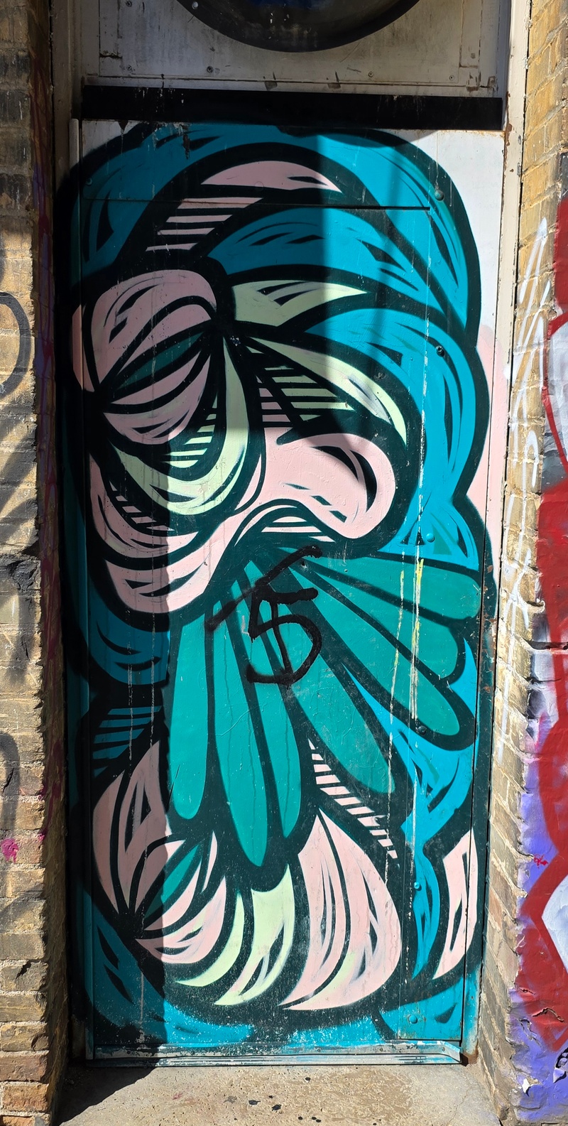 mural in Saskatoon by artist unknown.