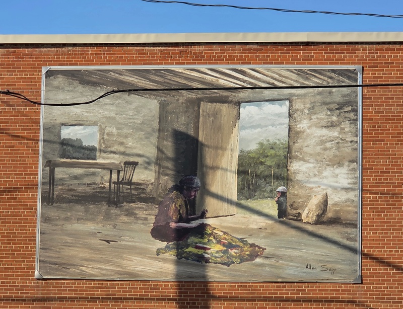mural in North Battleford by artist unknown.