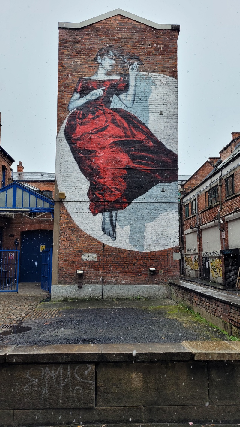 mural in  by artist Snik.