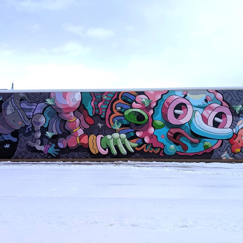 mural in Denver by artist Birdcap.