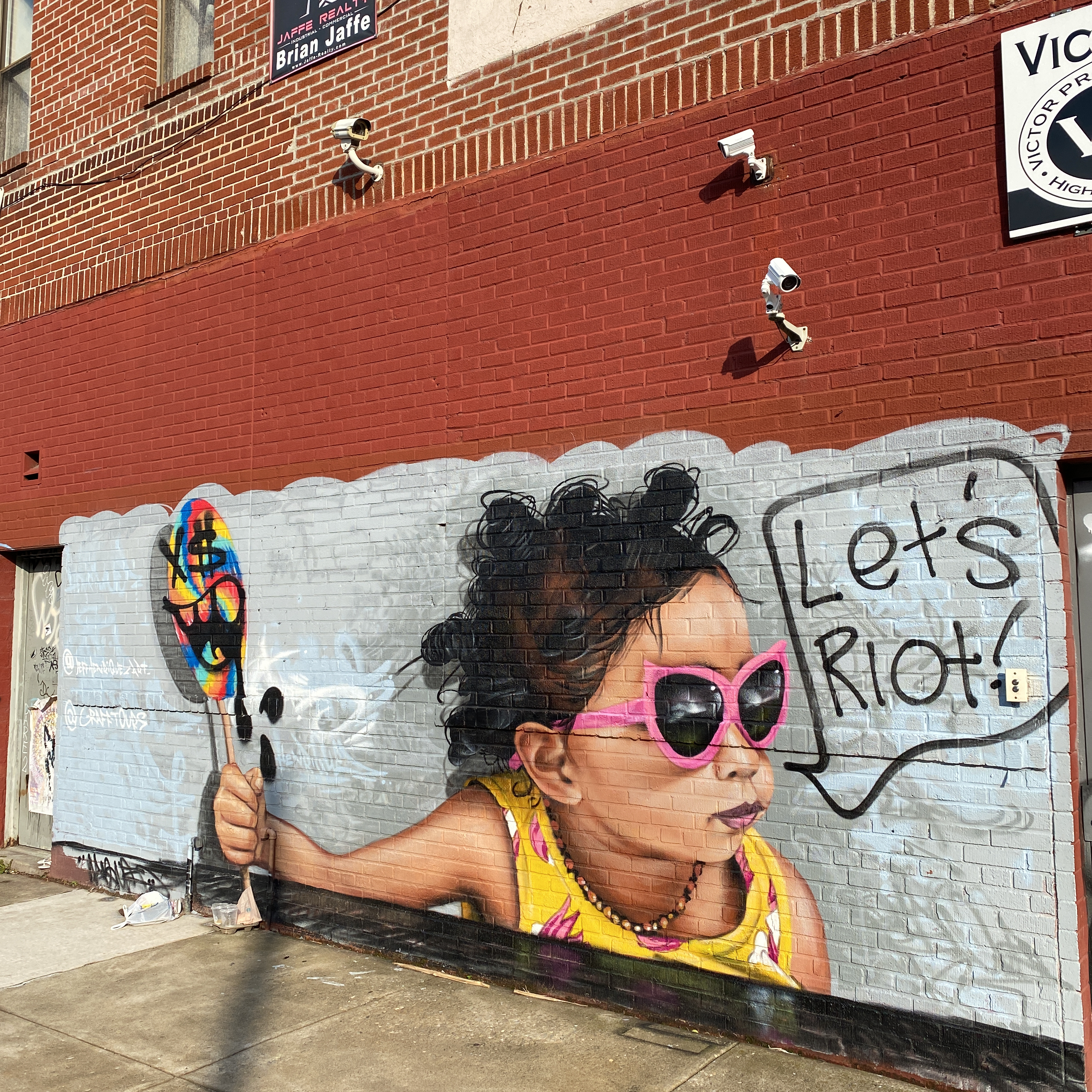 mural in Brooklyn by artist Jeff Henriquez.