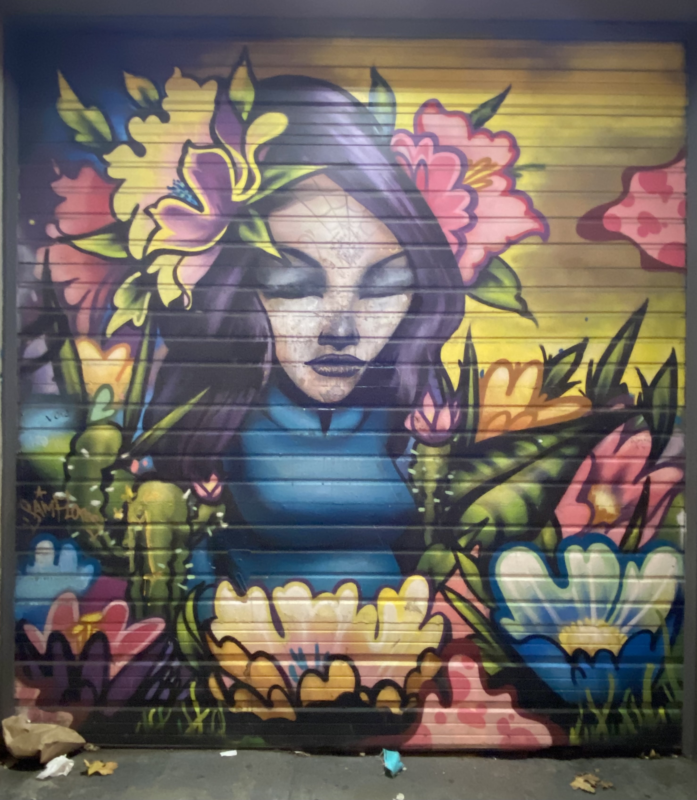 mural in San Francisco by artist Sam Flores.