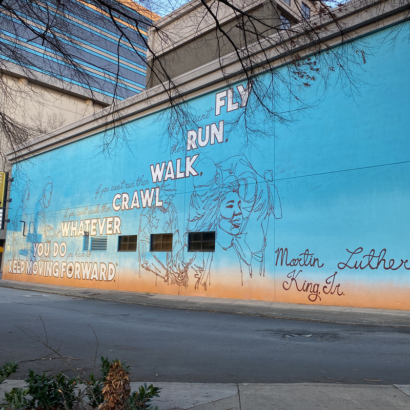 mural in Atlanta by artist Yehimi CambroΜn.