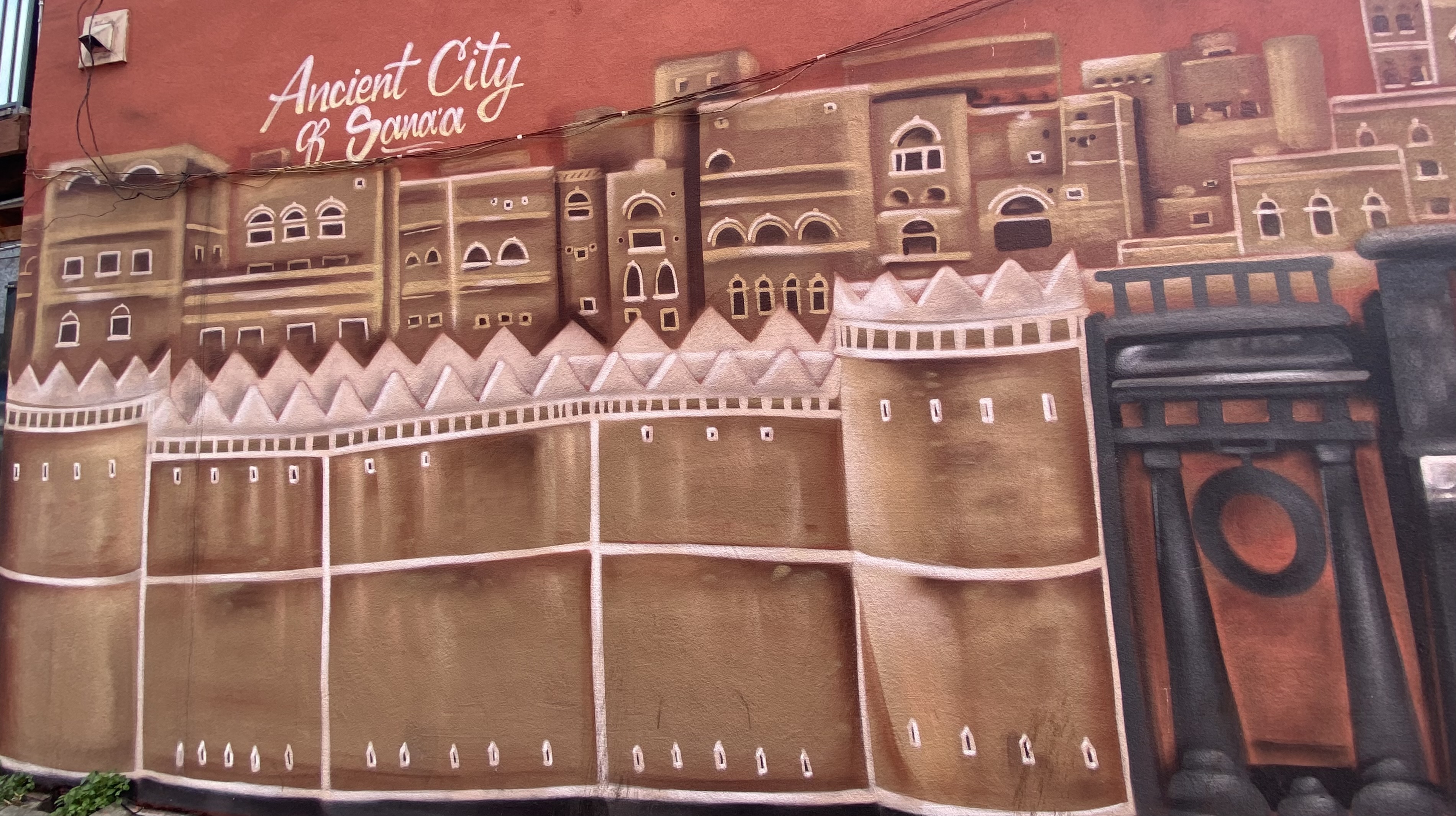 mural in Oakland by artist unknown.