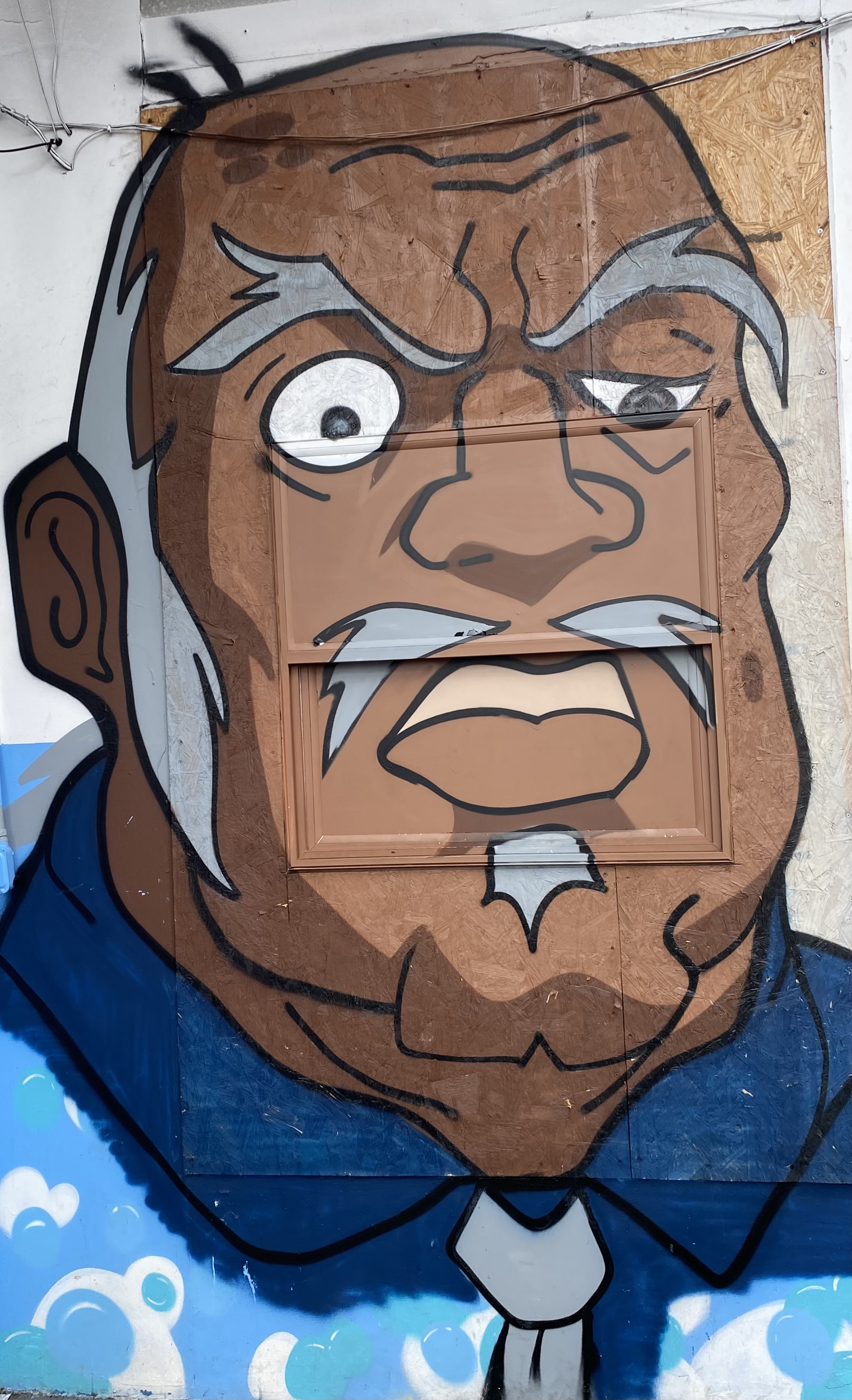 mural in Oakland by artist unknown.