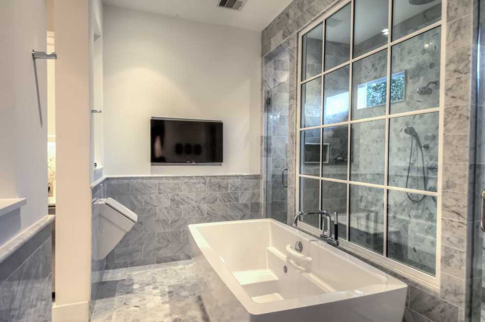 Flat TV Installation For Modern Bathroom With Marble Tile 