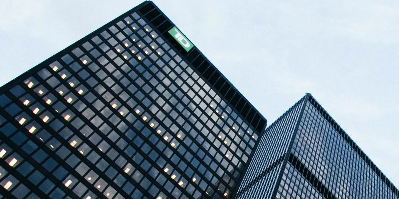 Modern Glass Skyscrapers in Urban Skyline for How to Use a Startup Funding Simulation to Explore Startup Financing in the Classroom