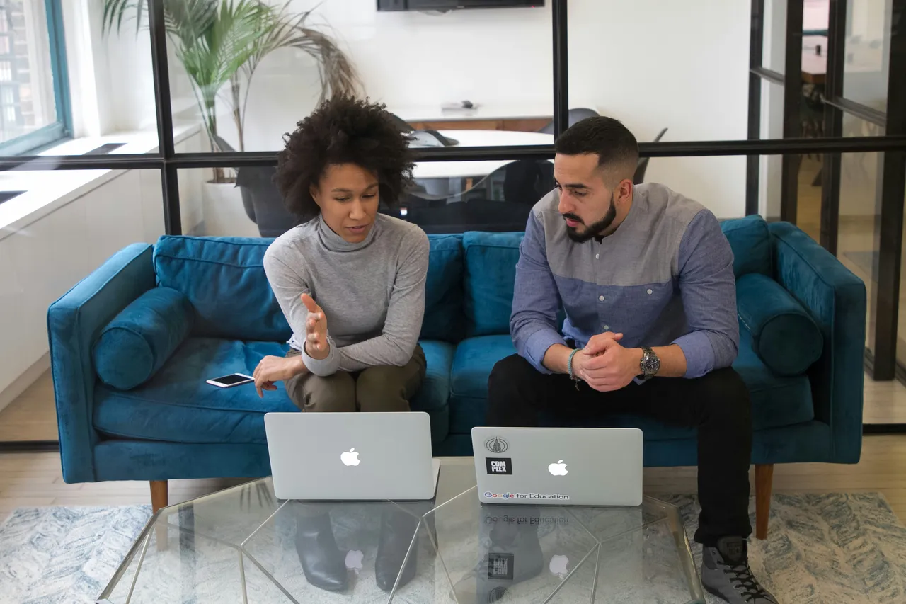 Collaborating Professionals in Modern Office for The Day in the Life of a Wealth Manager