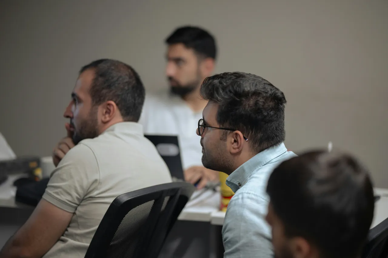 Men in Meeting for Improving Employee Engagement with Gamified Learning