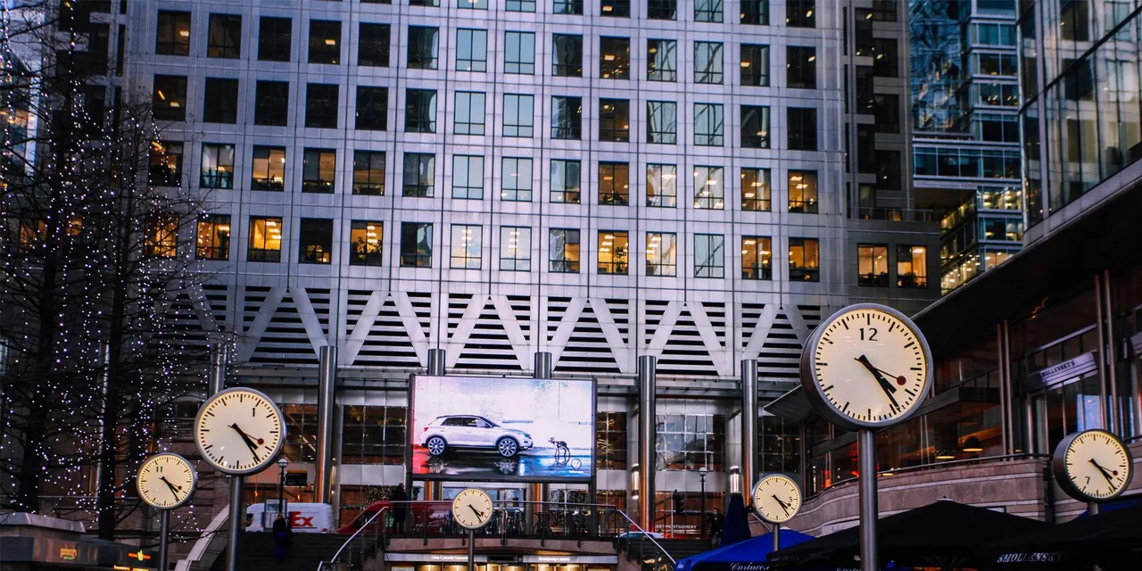Urban Financial District with Clocks for A Day in the Life of an Investment Banking Analyst