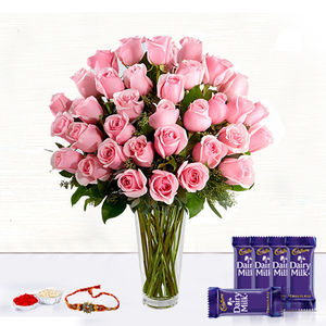 Admiring PInk Roses  - Rakhi & Dairy Milk