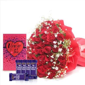 Flowers of Decades - In Tissue Wrap with Dairy Milk Chocolates and A Greeting Card