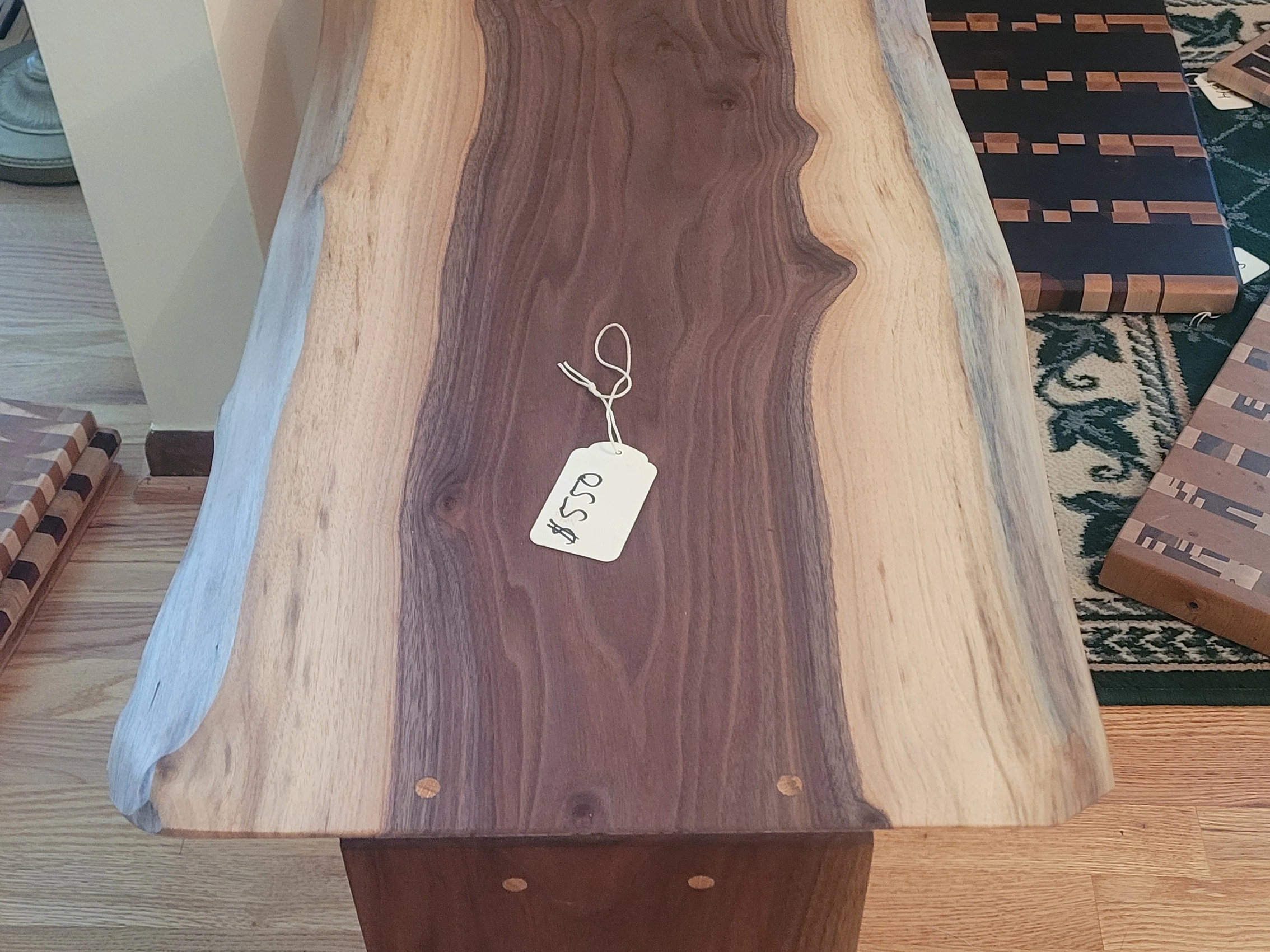 Close-up detail of walnut grain and live edge profile