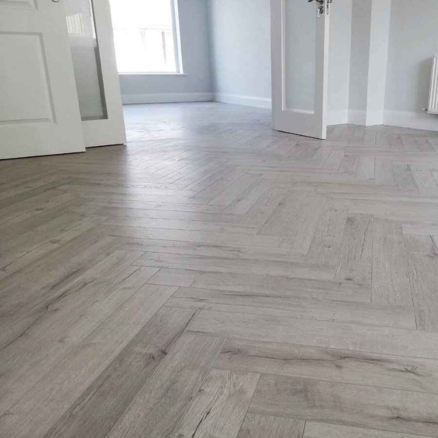 Dove Grey Herringbone 12mm Laminate