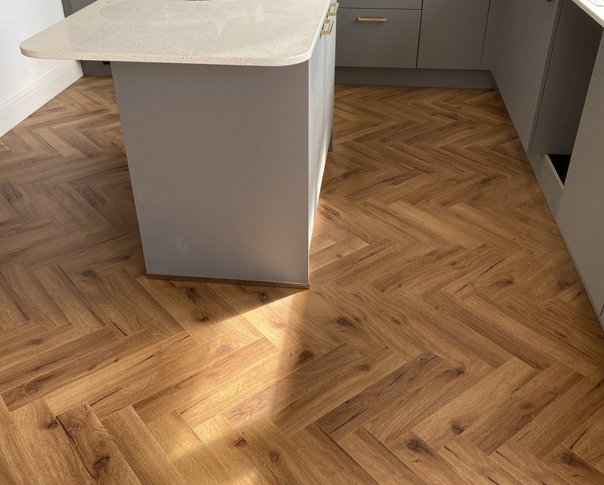 Fumed Oak Herringbone 12mm Laminate