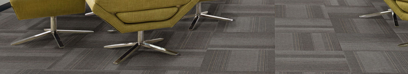 Patterned carpet tiles on office floor