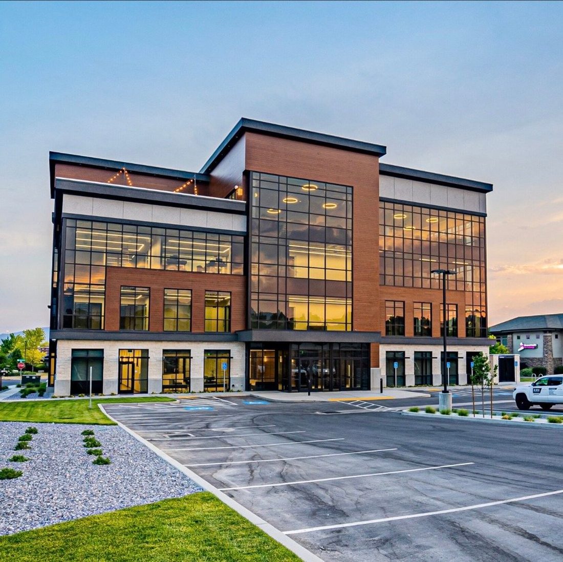 Lehi Shared Workspaces building exterior at dusk