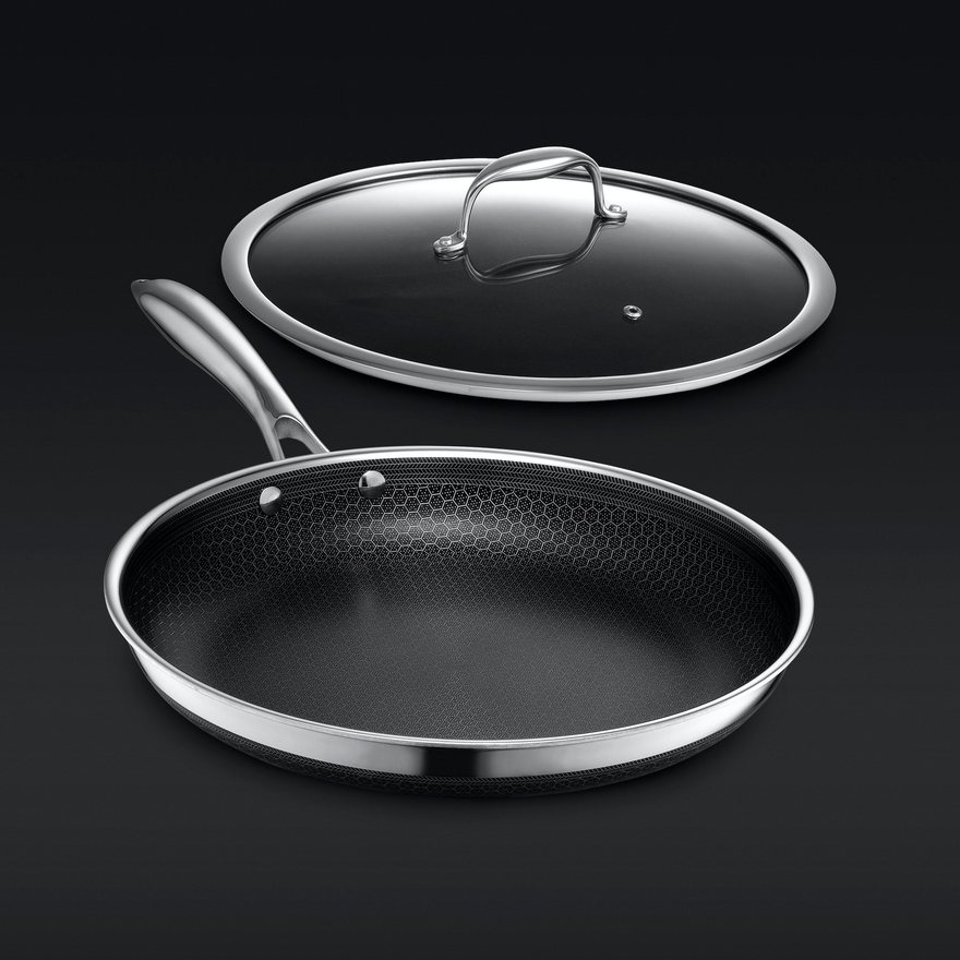 The HexClad hybrid pan — laser-etched hexagon surface, steel and nonstick, the pan a Michelin chef reaches for