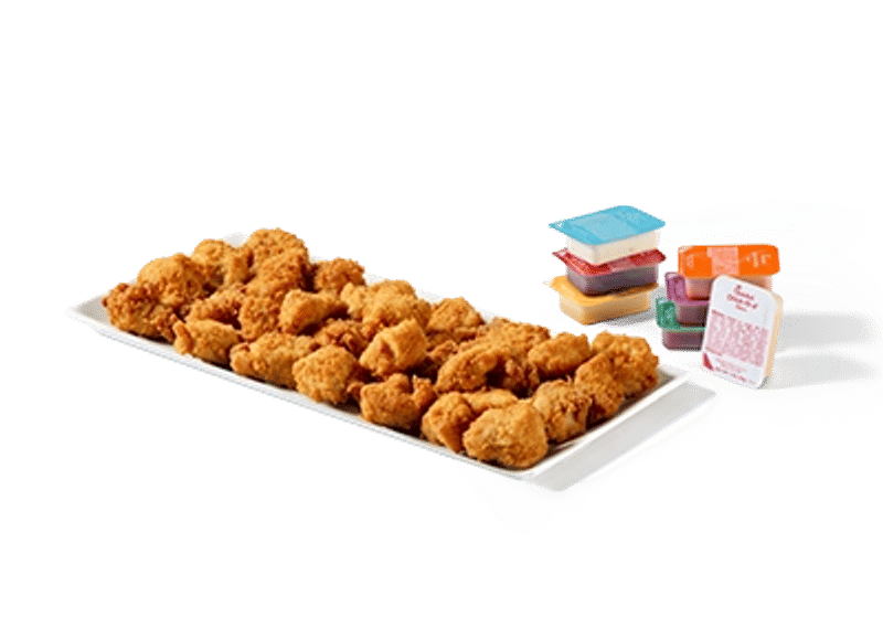 A tray of Chick-fil-A Nuggets with dipping sauce