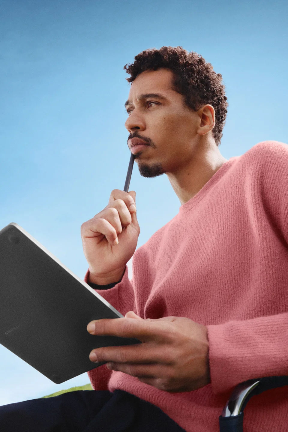 A man thinking while using the reMarkable
