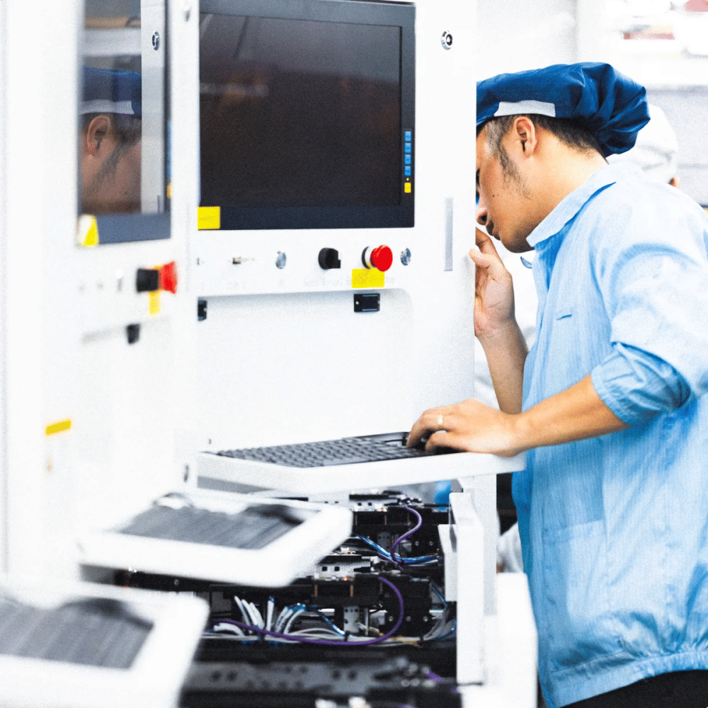 Worker in an industry location controlling the production