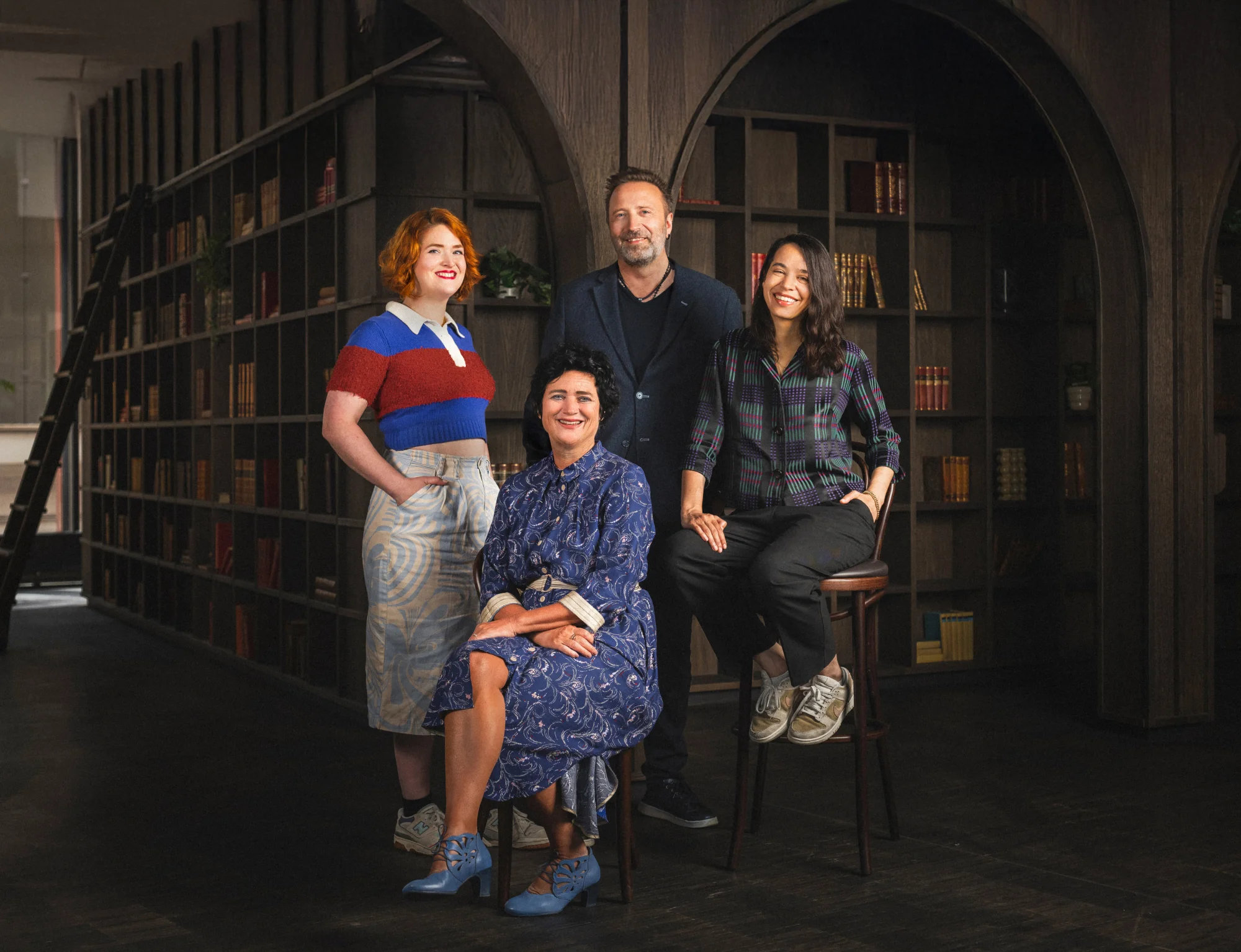 A group photo of the Scientific advisory board in a library setting - Dr. Thomas Ramsøy Neuroscientist and neurotechnology expert, Audrey van der Meer Neuroscientist specializing in learning and handwriting, Amber Case Calm technology pioneer and Anne-Laure Le Cunff Mindful productivity expert and founder of Ness Labs