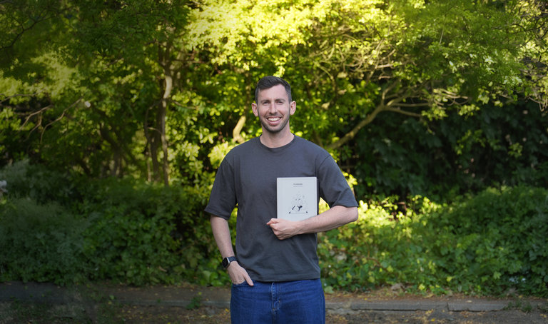 Gabriel Nussbaum holding his reMarkable Paper Pure tablet.