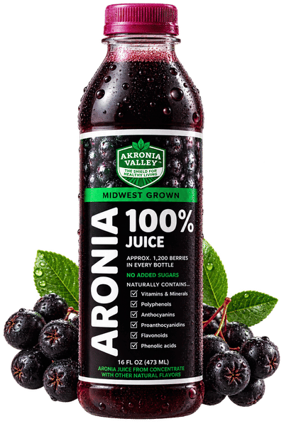 Aronia juice bottle with berries and leaves