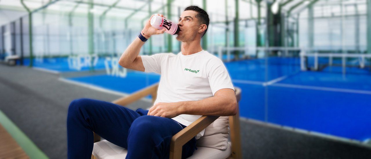 Cristiano Ronaldo drinking CR7 Drive