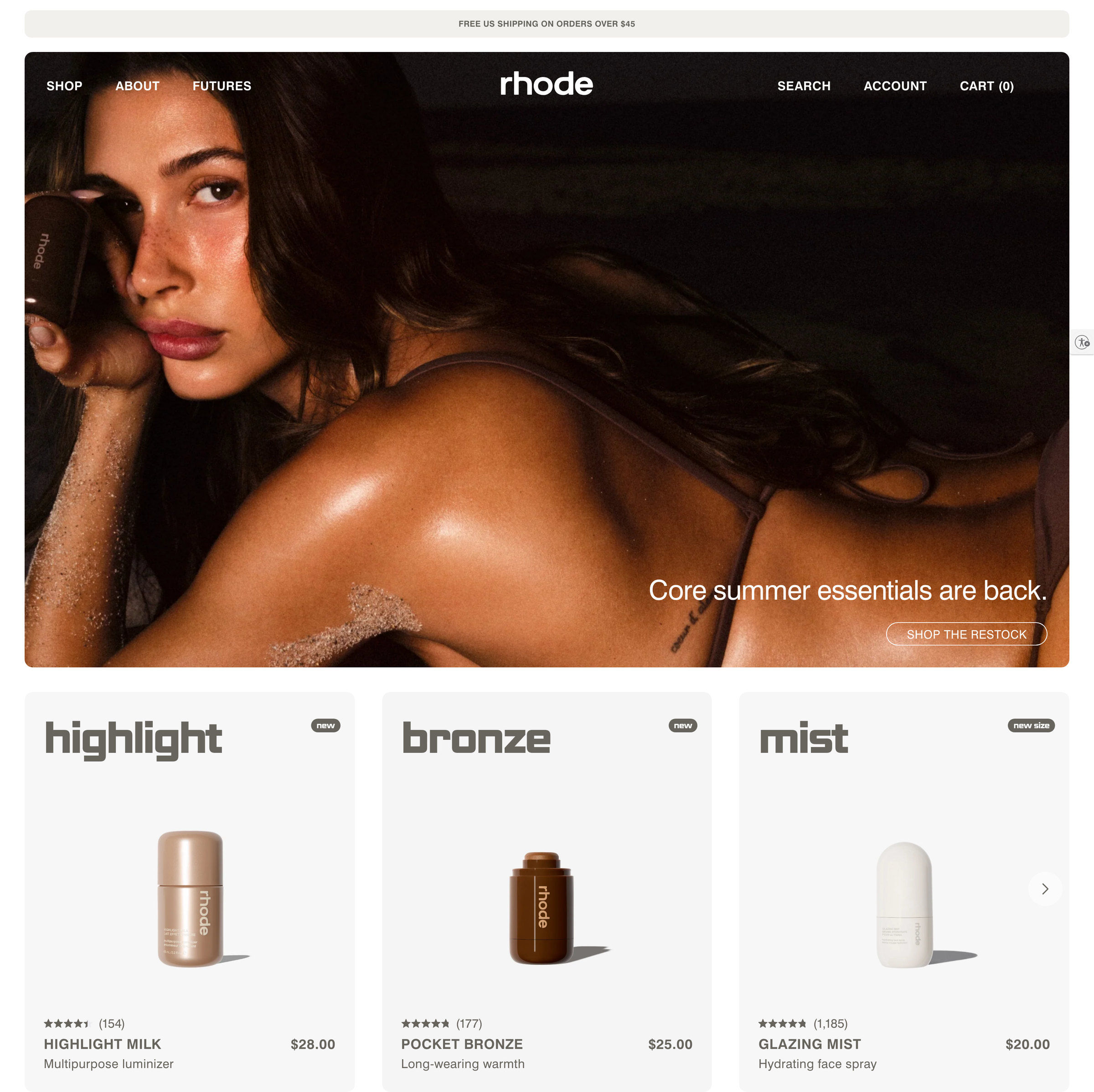 Rhode homepage: Hailey Bieber as the hero image, Core summer essentials restock, and the product row at $20–$28
