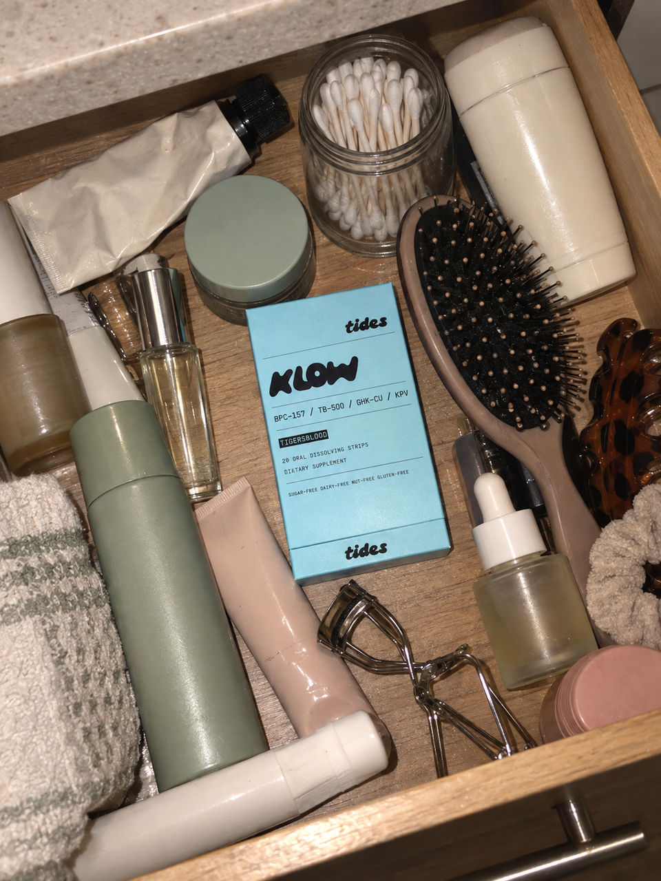 KLOW tucked into a bathroom drawer