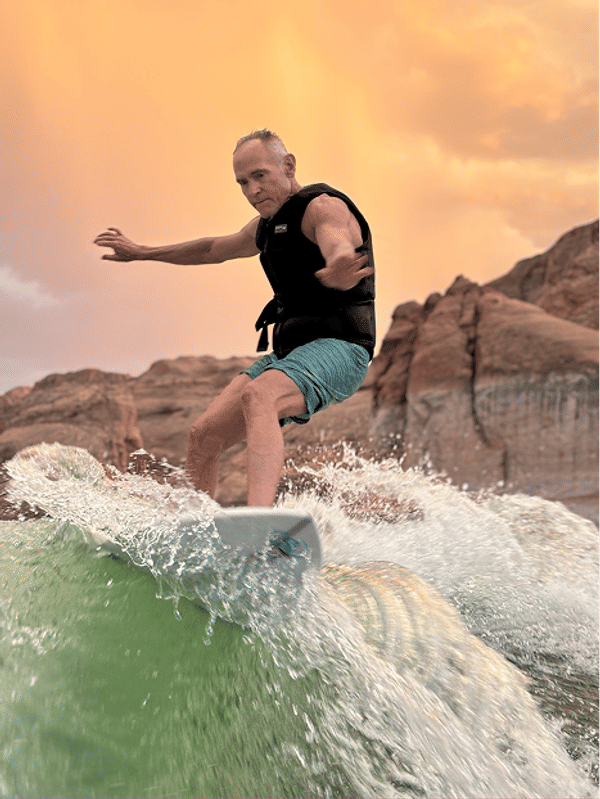 Dr. Porter wakesurfing at sunset