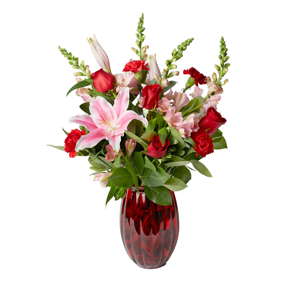 True Romance features Pink Stargazer Lilies, Red Roses, Pink Snapdragons, Red Carnations and Pink Alstroemerias